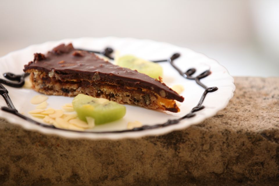 Dubrovnik Gastronomy: 3-Hour Food and Wine Tour - Dessert inside the walls: Croatian cake at the patisserie
