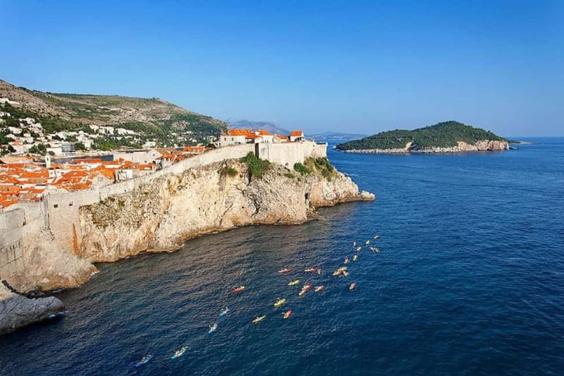 Dubrovnik: Guided Sunset Sea Kayaking with Snacks and Wine - The City Walls Segment: Seeing Dubrovnik From Sea Level