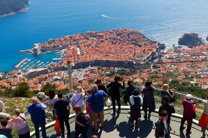 Dubrovnik Panorama Sightseeing with Tour Guide in Minivan - Buža Gate Drive-By and the Moment Before Old Town Time