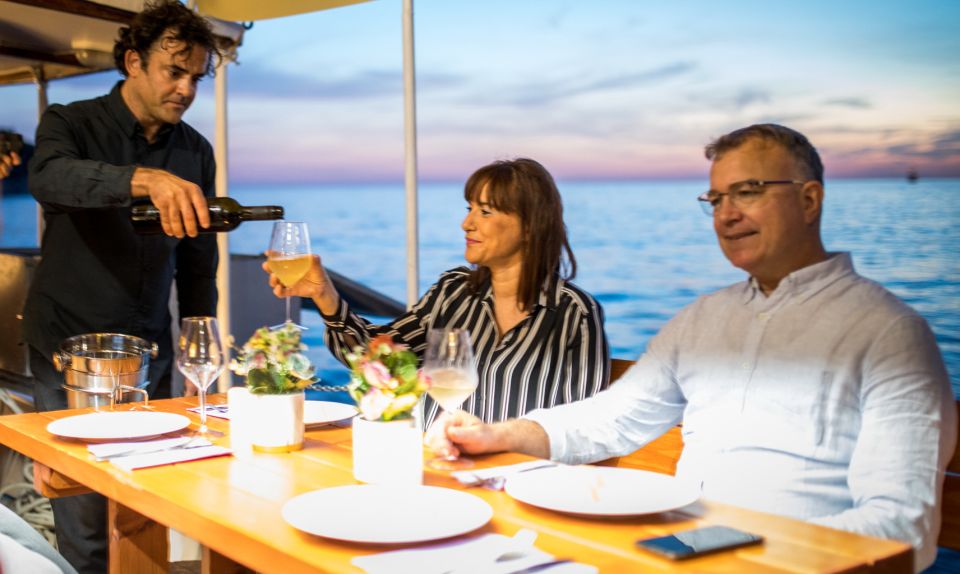 Dubrovnik: Sunset Dinner Cruise around the Old Town - The Romantic Part: City Walls Seen From the Water After Dark