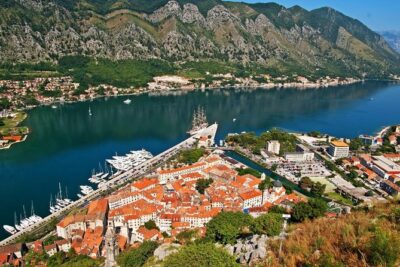 Kotor Bay Day Trip from Dubrovnik with Boat Ride to Lady of the Rock - Crossing Into Montenegro: Passport, Waiting, and the Scenic Payoff