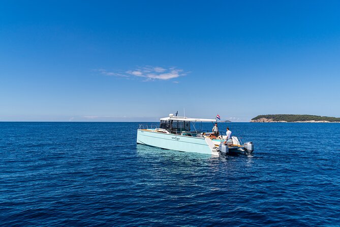 Luxury Blue Cave and Elaphiti Islands Small Group Tour - Šunj Beach on Lopud: Long Sand, Swim-to-Shore, and Beach Time