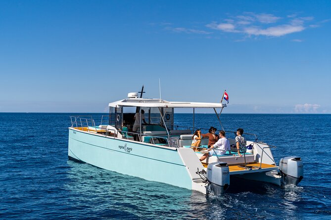 Luxury Blue Cave and Elaphiti Islands Small Group Tour - Koločep Island Stop: Blue Cave and the Cold-Water Reality