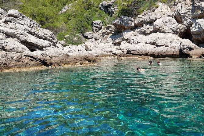 Private luxury speedboat tour-Islands, caves, beaches, snorkeling - On-Board Comfort: Drinks, Shade, Sundeck, and Your Own Playlist